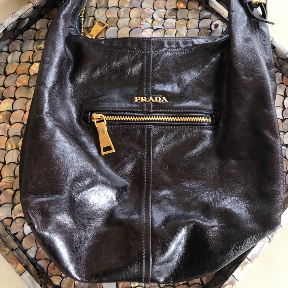 Prada hobo in a deep red wine color